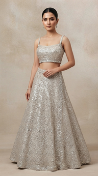 Ivory designer lehenga choli set with mirror, zari and beadwork for reception