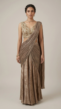 Front view of dusty brown satin pre-draped saree with embellished blouse, ideal for weddings, receptions and festive occasions