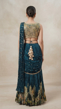 Teal blue Chinon pre-draped saree with hand embellished blouse and detailed border, perfect for weddings, parties, receptions and evening events