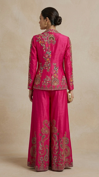 Rani pink floral printed blazer sharara set with hand embellished blouse, detailed embroidery and elegant floral print, perfect for weddings, parties and receptions