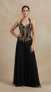 Black sharara set with red thread embroidery, cutdana and mirror work for evening parties and celebrations