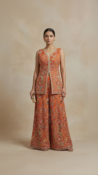Orange thread embroidered sharara suit with mirror work for weddings and festive celebrations
