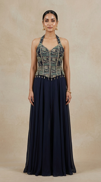 Blue halter neck embroidered palazzo suit with mirror, cutdana and sequin work for festive occasions