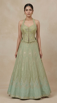 Green tissue silk lehenga choli with mirror embroidery for festive celebrations