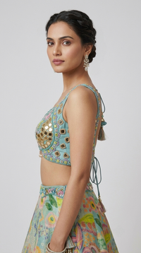 Blue embroidered floral lehenga set styled for festive and party wear occasions