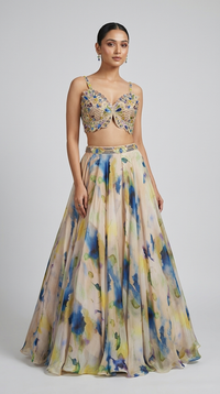 Cream embroidered lehenga with tissue organza skirt for wedding celebrations