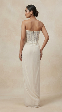Off-white embroidered corset and pleated skirt outfit for wedding, reception and celebrations