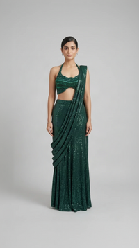 Green pre-draped halter neck saree with gems and sequin embellishments for wedding and sangeet