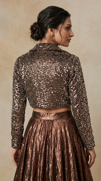 Brown designer lehenga choli set with sequin embellishments for engagement and pre-wedding celebrations