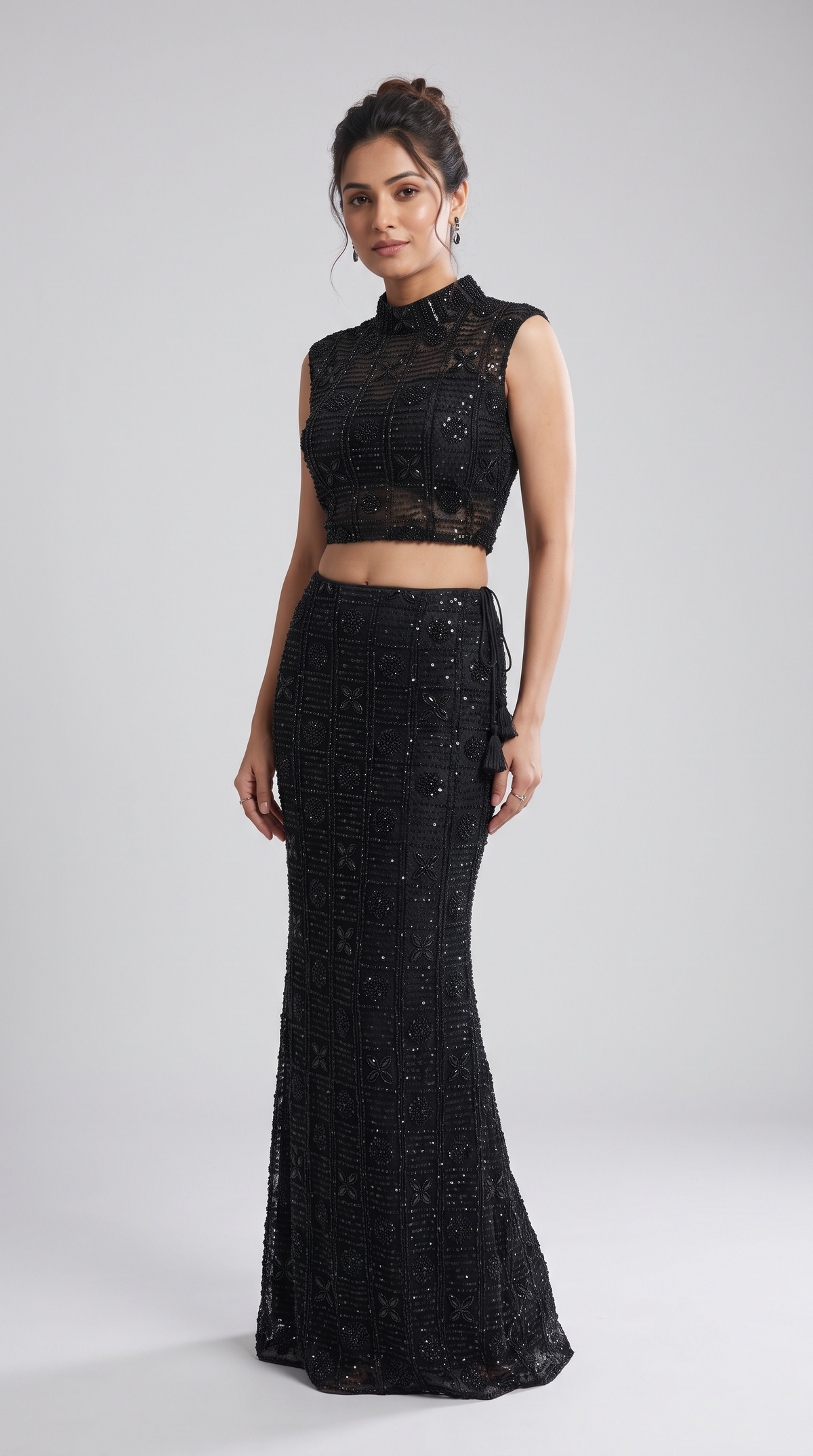 Designer black skirt and blouse set with intricate bead embroidery for engagement and cocktail parties