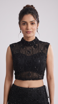 Black embellished blouse with beadwork paired with a statement skirt for wedding and festive wear