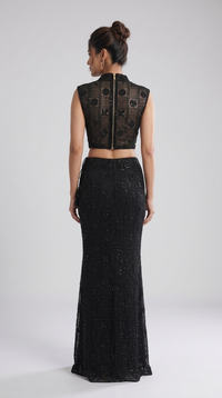Close-up of black blouse with intricate bead embroidery for designer ethnic party wear
