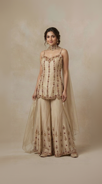 Cream intricately embroidered salwar suit set for women, elegant ethnic wear for weddings and festive occasions