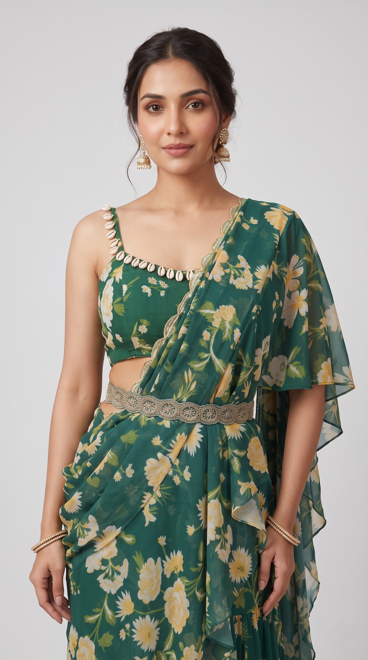 Green embroidered ready-to-wear saree showcasing floral detailing, suitable for sangeet ceremonies, cocktail parties and evening events