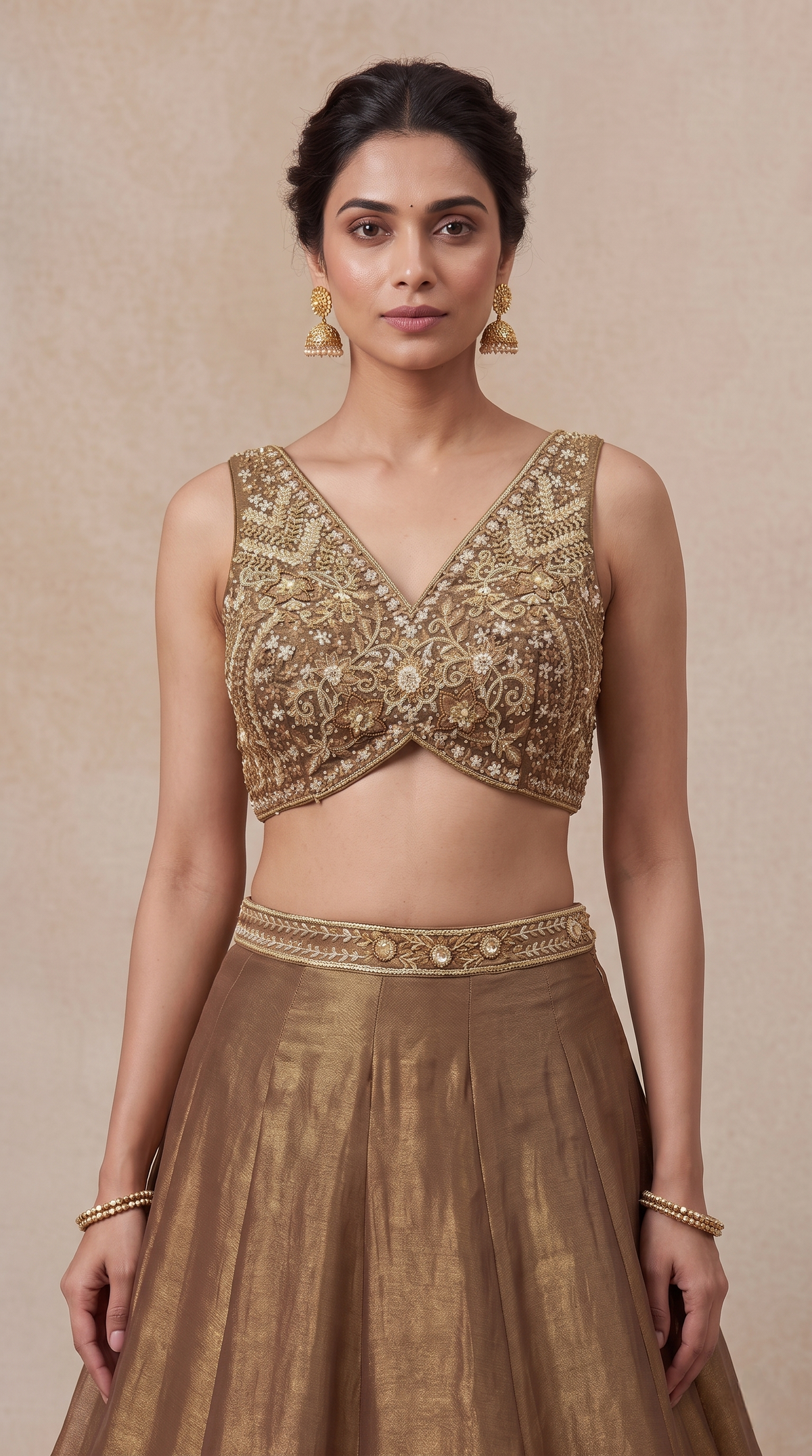 Brown thread embroidered lehenga choli showcasing detailed embroidery on tissue silk fabric, suitable for sangeet and wedding functions
