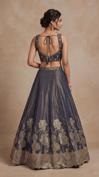 Blue tissue silk lehenga and choli with cutdana embellishments, designer Indian ethnic wear for wedding guests and festive occasions
