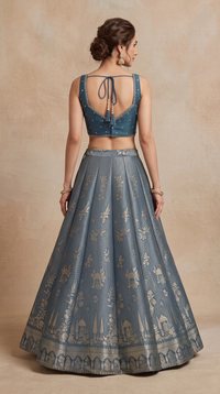 Teal blue embroidered Banarasi silk lehenga choli with Zardosi detailing, elegant ethnic wear for weddings and special occasions