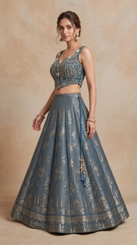 Teal blue Banarasi silk lehenga with intricate Zardosi embroidery, designer Indian ethnic wear for wedding celebrations