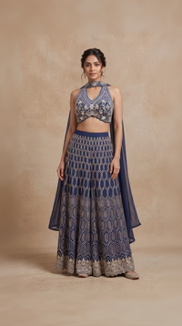 Blue halter neck cutdana embellished palazzo set for women, elegant Indian ethnic wear for weddings, sangeet, engagement and festive occasions.