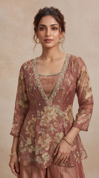 Elegant rust red floral printed sharara set for women, ideal for haldi ceremonies, mehndi functions, pre-wedding celebrations and bridesmaid wear.
