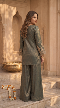 Beautiful green silk salwar sharara outfit, perfect for Indian wedding wear, haldi ceremonies, mehndi functions, sangeet and festive parties.