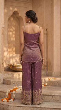 Purple silk spaghetti salwar kameez set, fashionable Indian party wear for wedding receptions, engagement ceremonies and family celebrations.