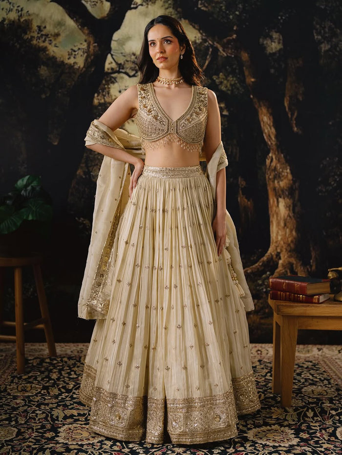 IVORY HAND EMBROIDERED TISSUE SILK LEHENGA SET | Nishly Fashion House