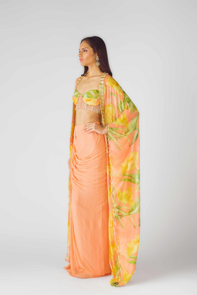 ORANGE FLORAL DRAPE SKIRT SET WITH CAPE & EMBELLISHED BLOUSE