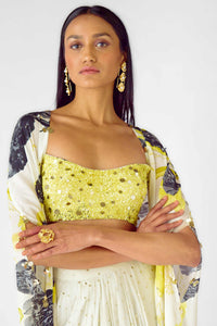 YELLOW FLORAL CAPE AND SKIRT SET FEATURING A MIRROR EMBELLISHED BLOUSE