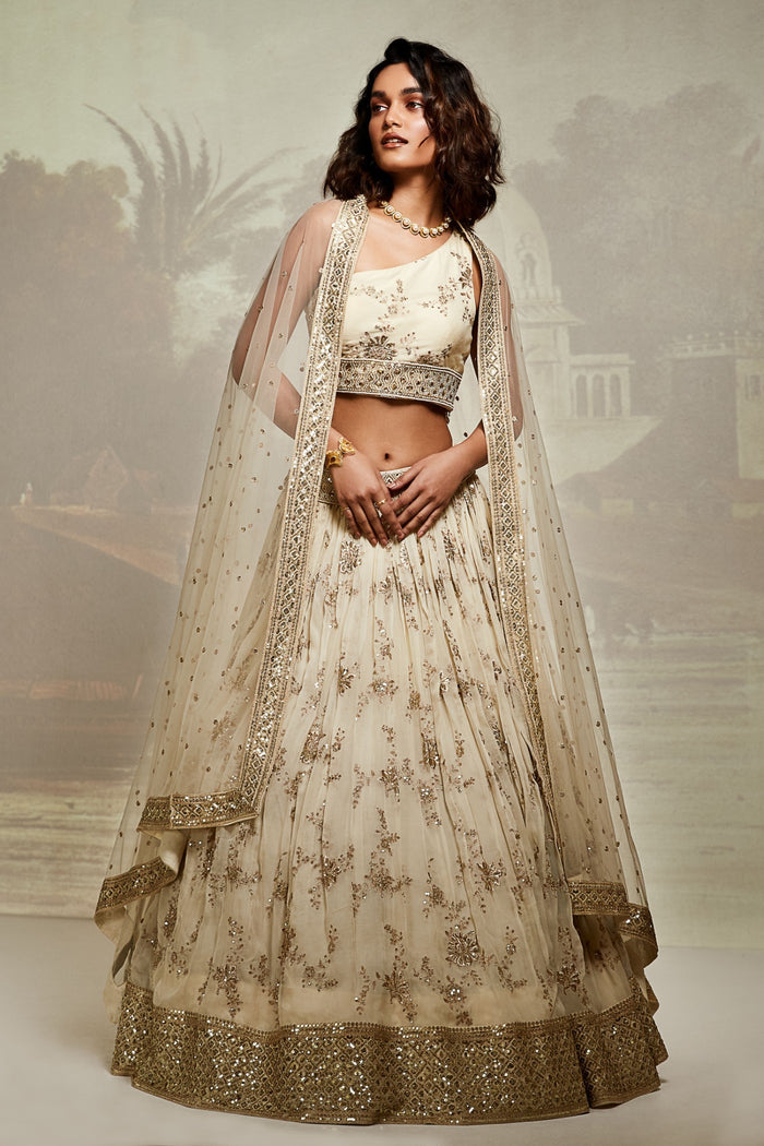 ONE SHOULDER IVORY EMBROIDERED LEHENGA SET