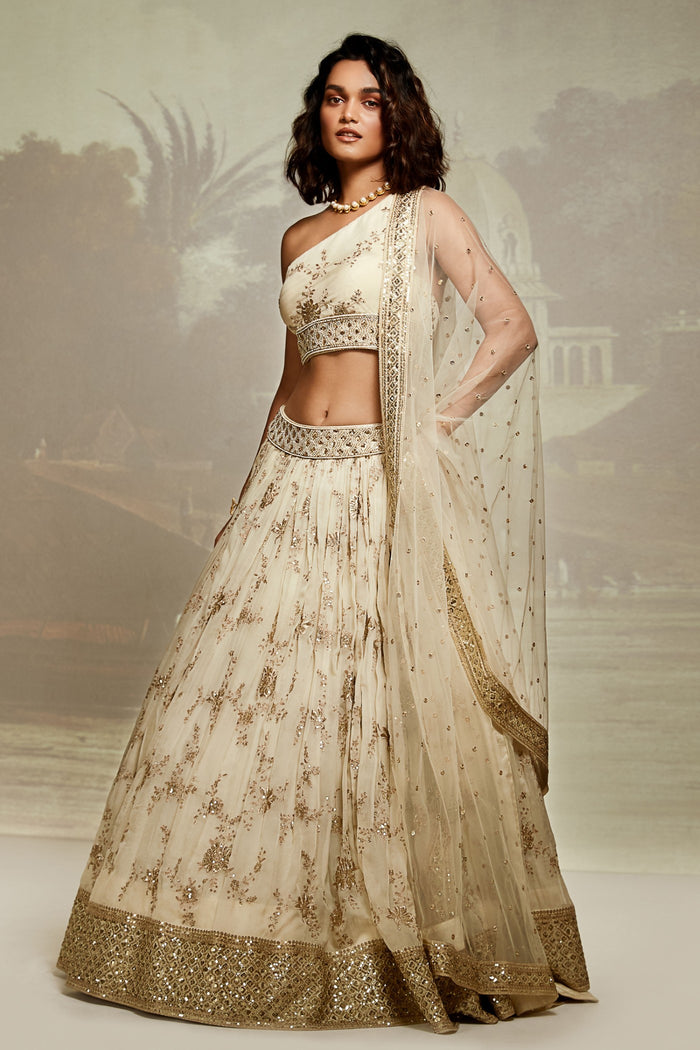 ONE SHOULDER IVORY EMBROIDERED LEHENGA SET