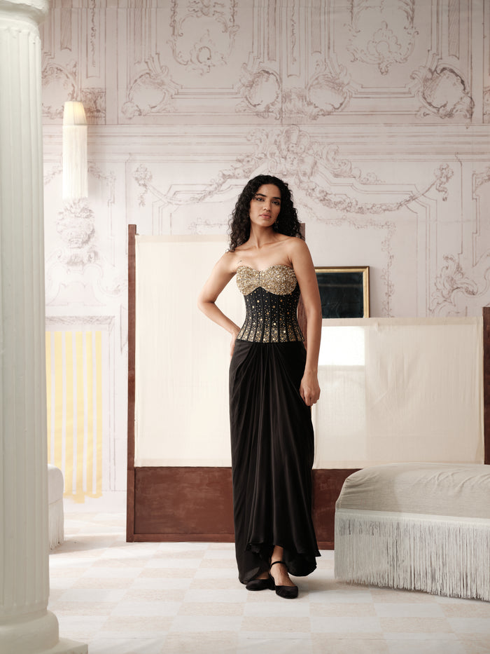 Black sculpted corset with pleated skirt for Sangeet party wear
