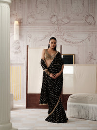 Black pre-draped mirror work saree with embellished blouse