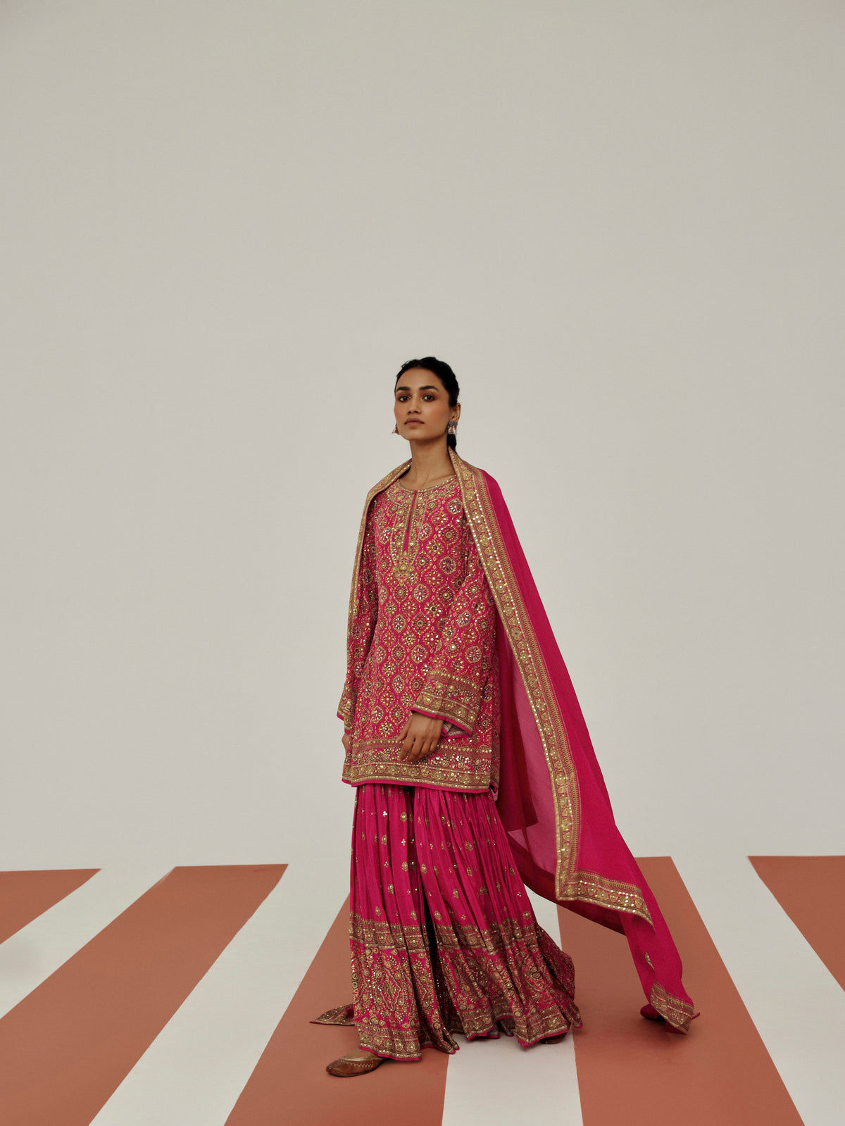 Pink sharara suit for women featuring a stylish ethnic look, ideal for wedding guest outfits, engagement parties, bridesmaid wear and celebrations.