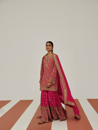 Pink sharara suit for women featuring a stylish ethnic look, ideal for wedding guest outfits, engagement parties, bridesmaid wear and celebrations.
