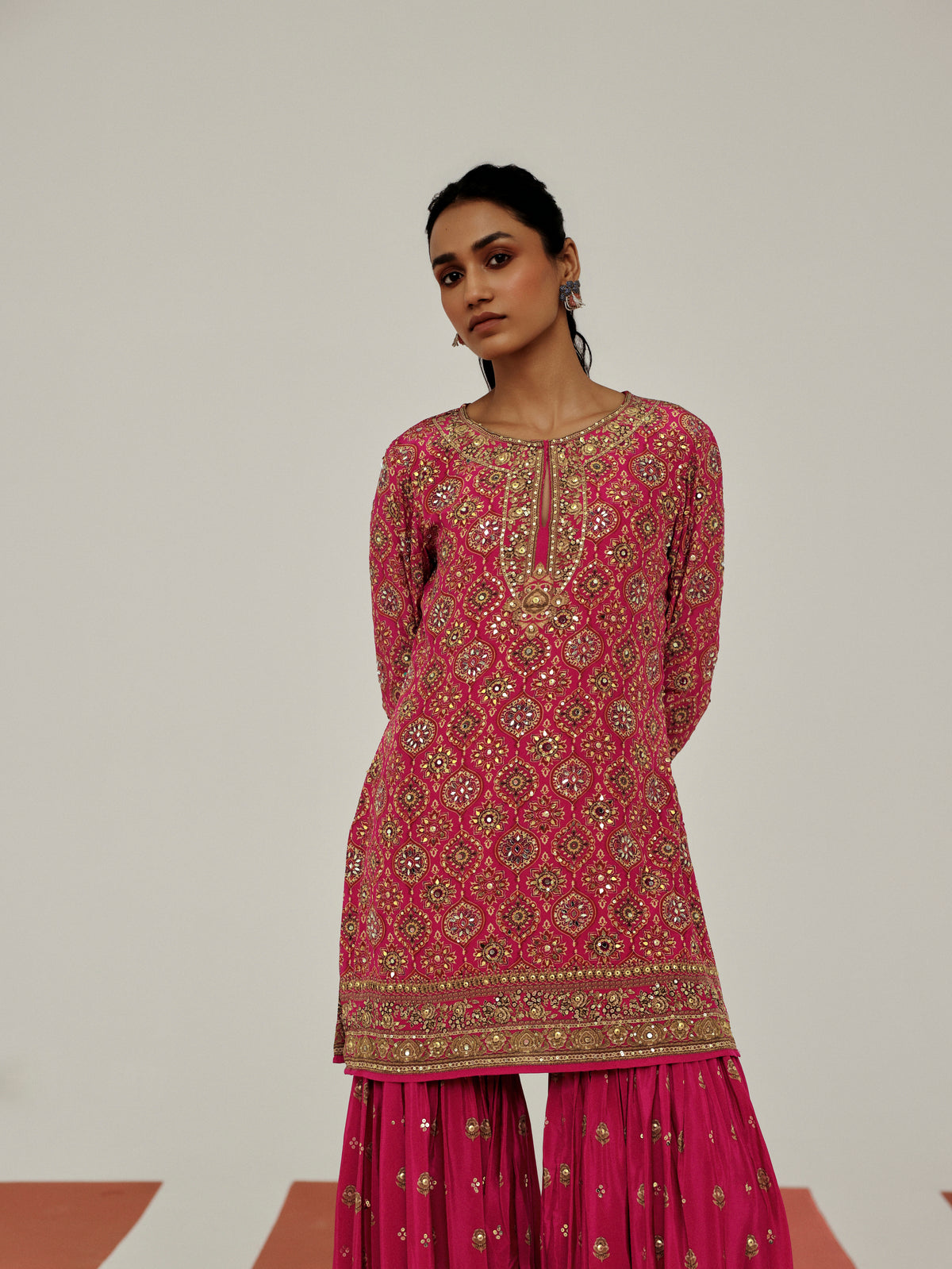 Elegant pink crepe sharara suit set for party wear, festive occasions, wedding functions, sangeet nights and traditional Indian celebrations.