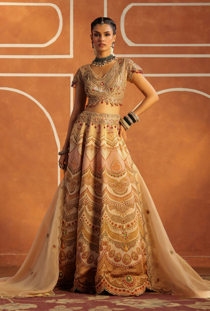 ETHNIC GOLD LEHENGA WITH INTRICATE EMBROIDERY