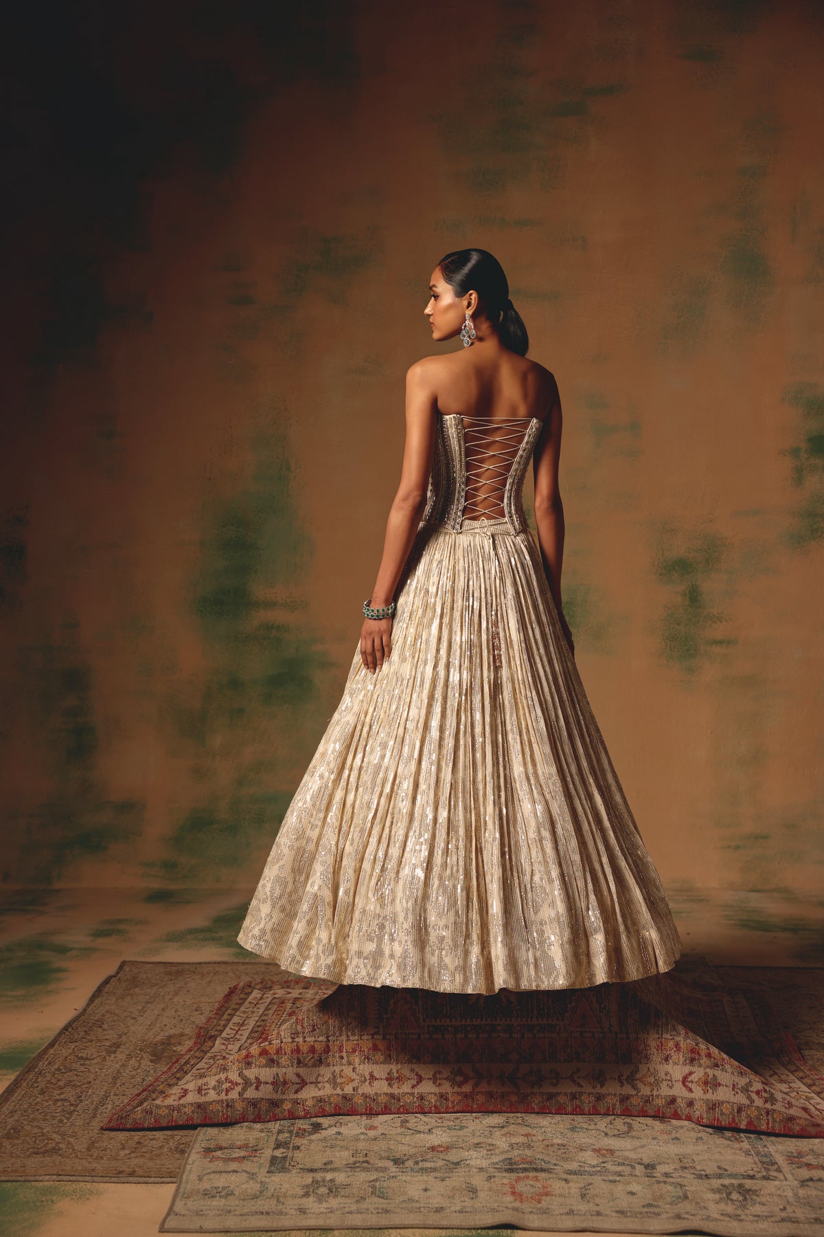 IVORY SEQUINS EMBROIDERED CORSET LEHENGA SET | Nishly Fashion House