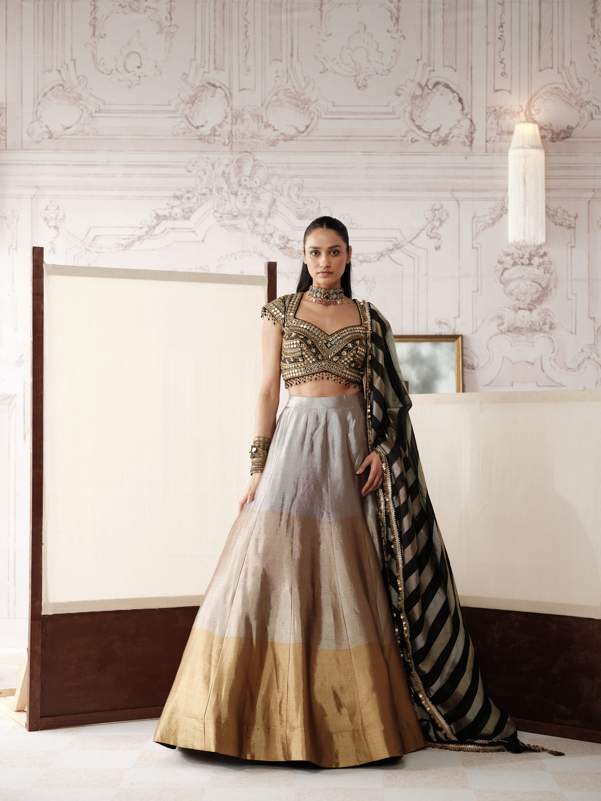 BLACK AND GOLD EMBROIDERED TISSUE SILK LEHENGA SET