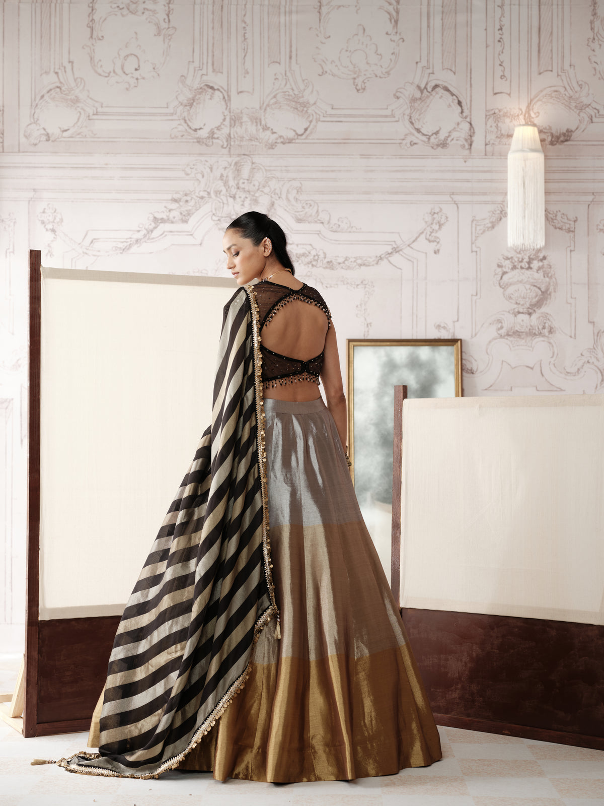 BLACK AND GOLD EMBROIDERED TISSUE SILK LEHENGA SET
