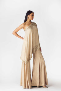GOLD COCKTAIL SHARARA SET WITH ASYMMETRICAL ONE SHOULDER CUT