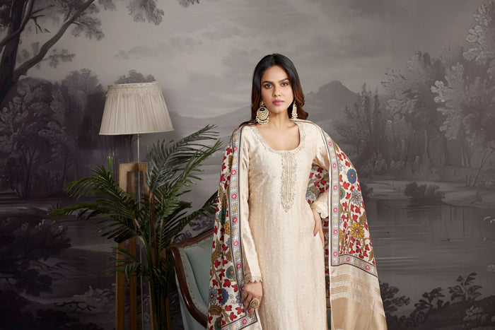 CREAM THREAD EMBROIDERED SALWAR SILK SUIT.