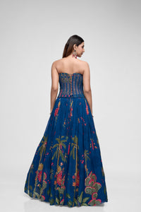 Detailed view of blue printed lehenga with intricate bead embroidery and contemporary corset blouse, perfect for sangeet, reception, and party wear.
