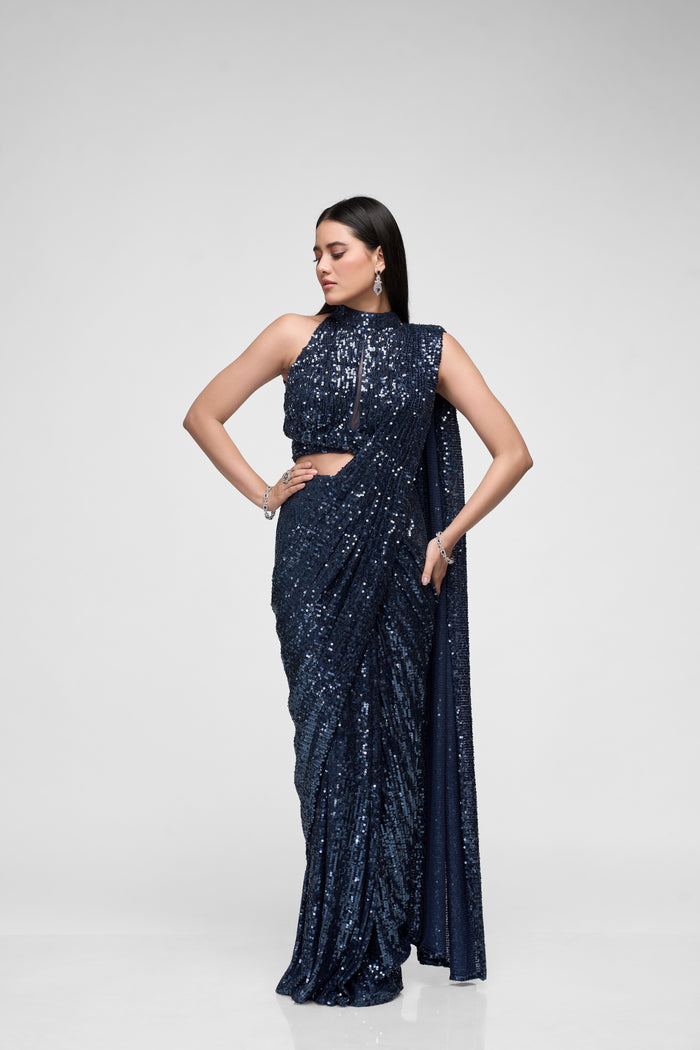 Blue sequin saree with shimmering embellishments for cocktail and party wear