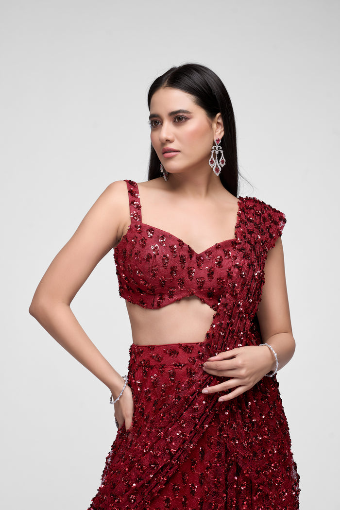 Red sequin saree with embroidered detailing for wedding and reception wear