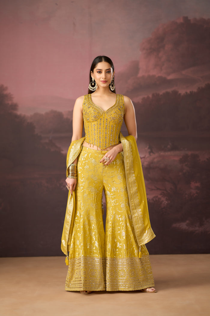 YELLOW MIRROR EMBROIDERED BANARASI CORSET SHARARA SET | Nishly Fashion House