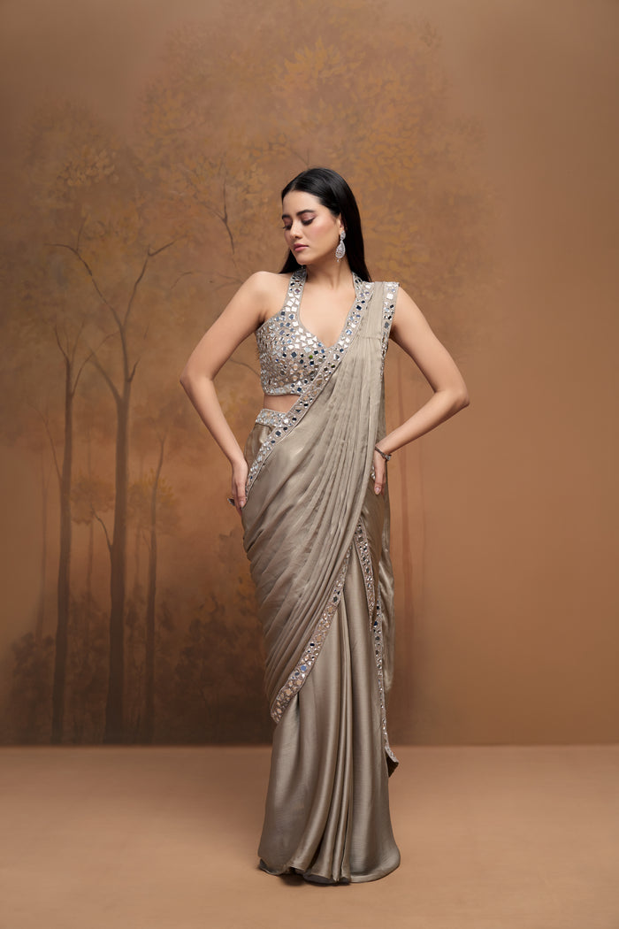 Beige halter neck mirror embroidered pre-draped saree for wedding and reception wear