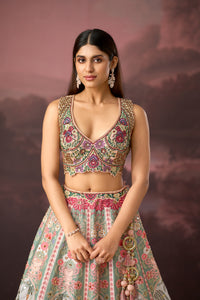 PEACH PRINTED SILK LEHENGA SET WITH INTRICATE EMBROIDERY | Nishly Fashion House