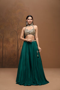Green mirror embroidered halter neck lehenga set for wedding and festive wear