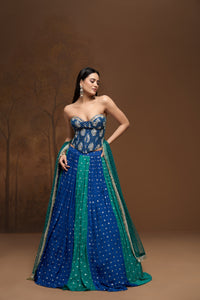 Green mirror embroidered corset lehenga set with embellished blouse, perfect for Indian weddings, sangeet, and festive celebrations.